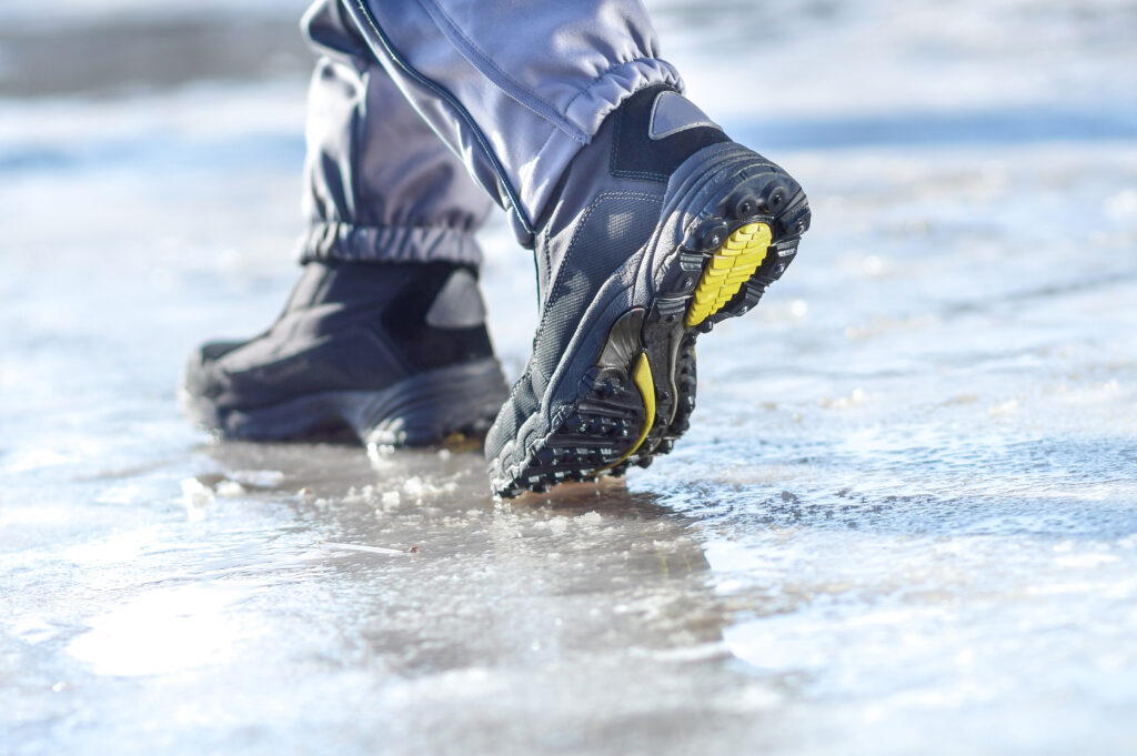 Person walking on icy road